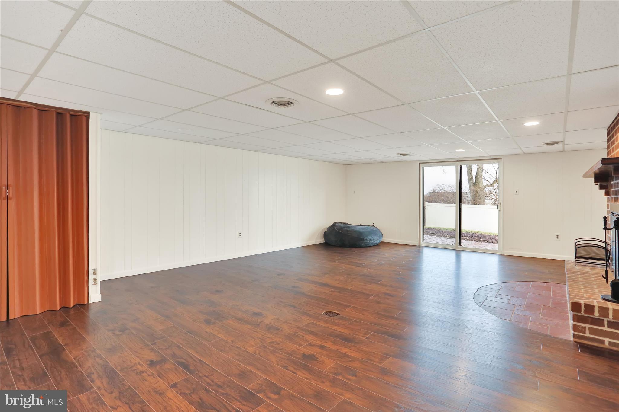 203 Pembroke Drive Shillington, PA 19607 - Photo 28 of 41 a view of empty room with wooden floor and fan