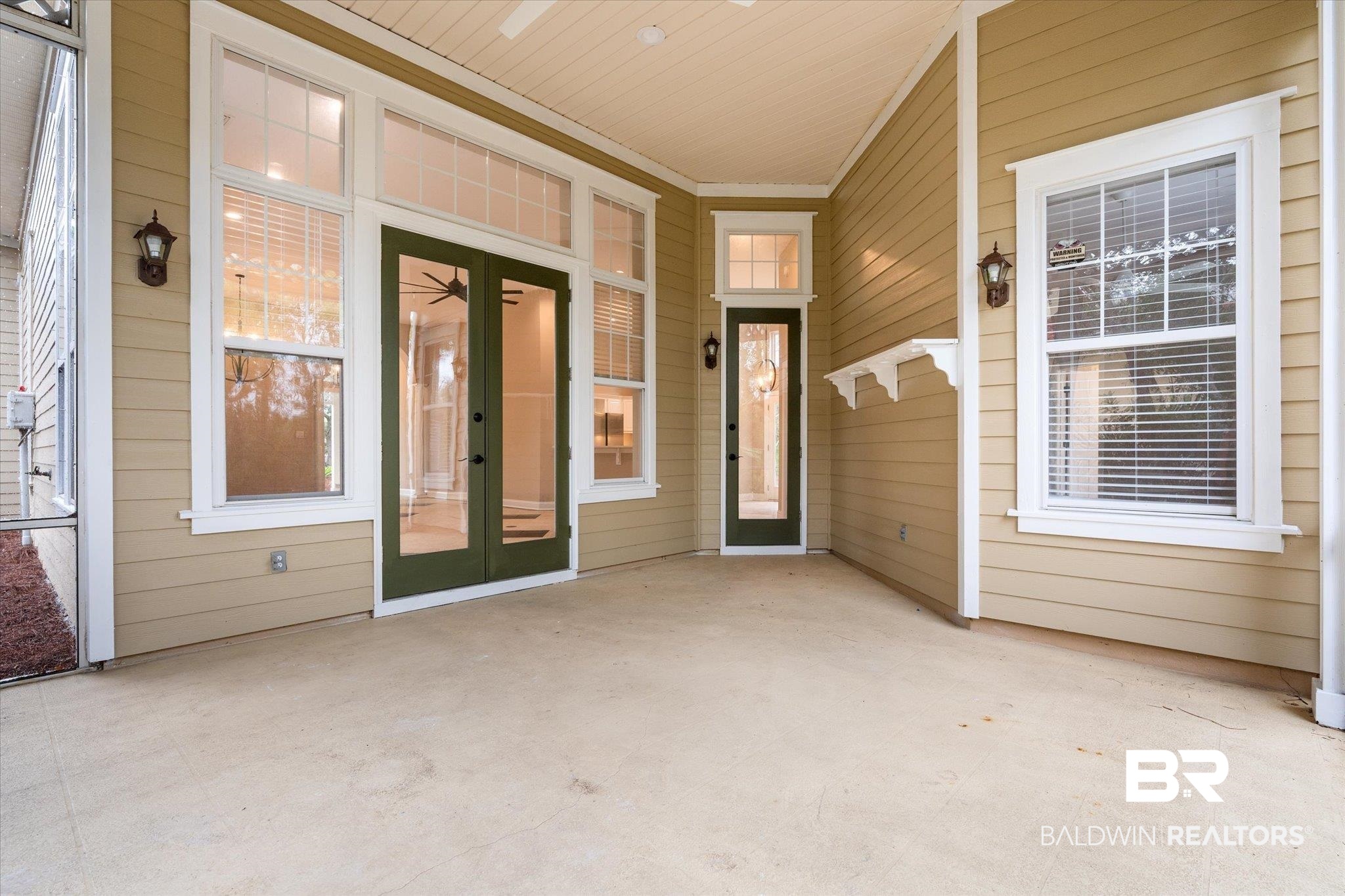 9259 Genipa Way Gulf Shores, AL 36542 - Photo 37 of 72 Doorway to property featuring a patio