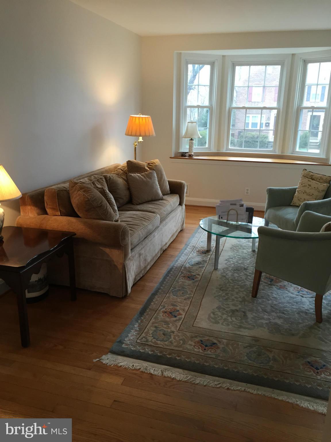 207 Stanmore Road Baltimore, MD 21212 - Photo 4 of 7 a living room with furniture and a window