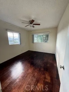 a view of room window and wooden floor