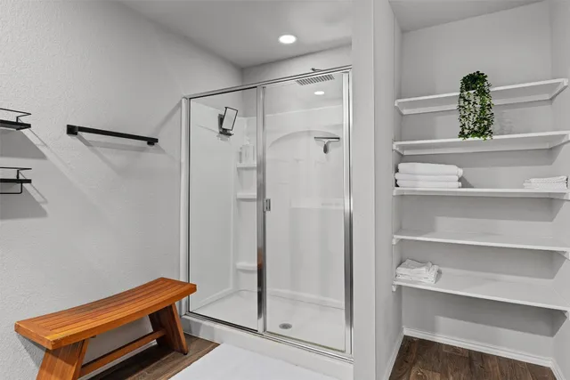 a view of bathroom with dual sinks
