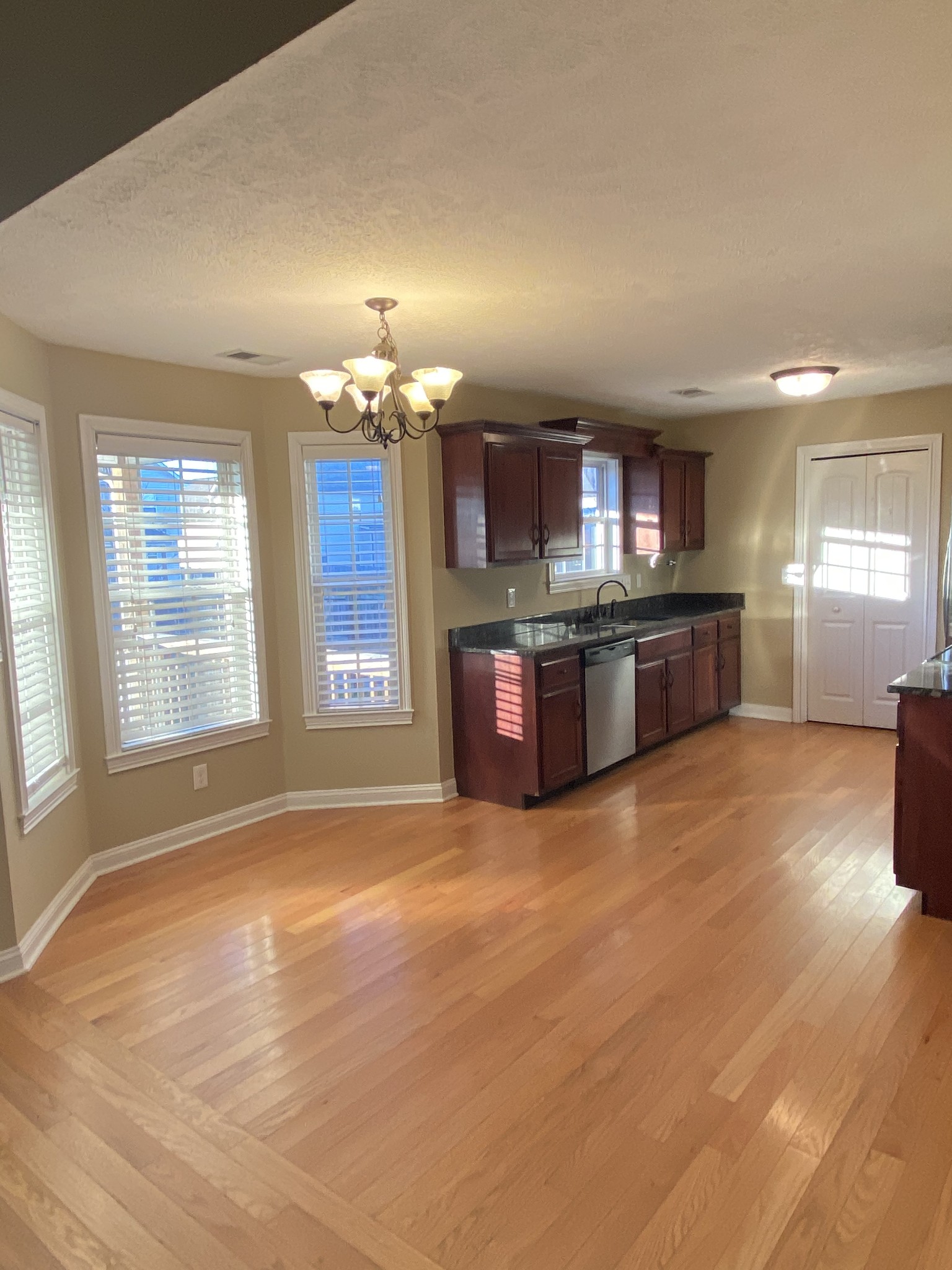3732 Suiter Road Clarksville, TN 37040 - Photo 4 of 14 a view of an empty room with kitchen and window