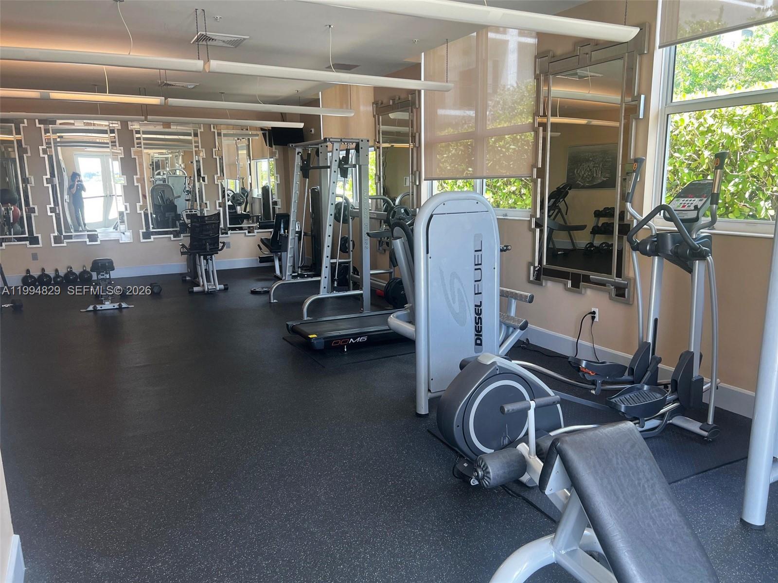 3180 Southwest 22nd Terrace, Unit 607 Miami, FL 33145 - Photo 16 of 18 a view of a room with gym equipment