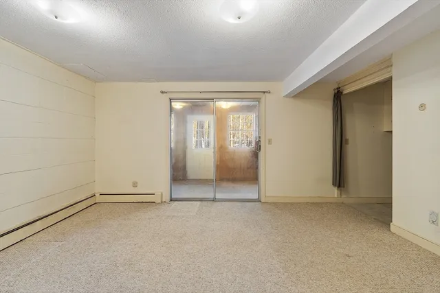 a view of a room with rack on the wall