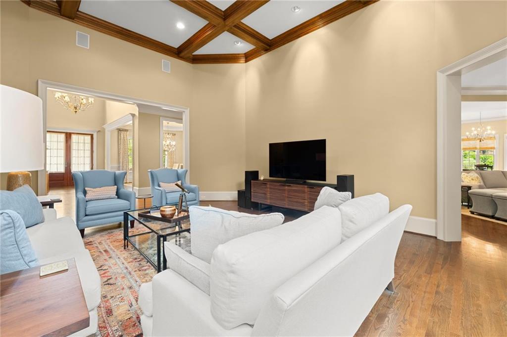 322 Edwards Brook Lane Canton, GA 30115 - Photo 19 of 99 a living room with furniture and a flat screen tv