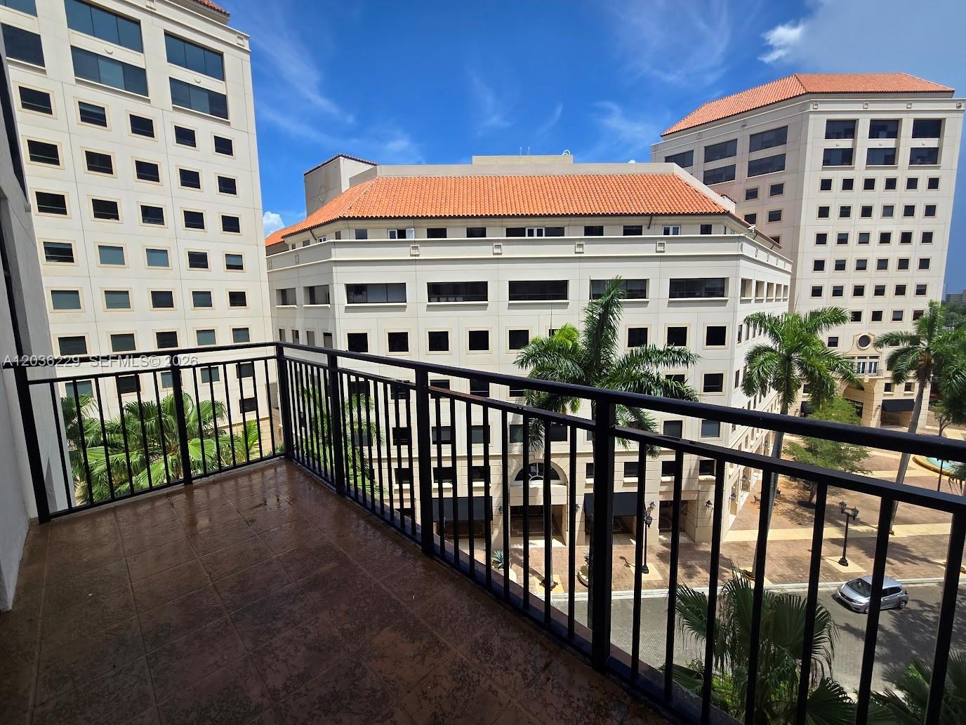 888 Douglas Road, Unit 605 Coral Gables, FL 33134 - Photo 21 of 21 a view of a building from a balcony