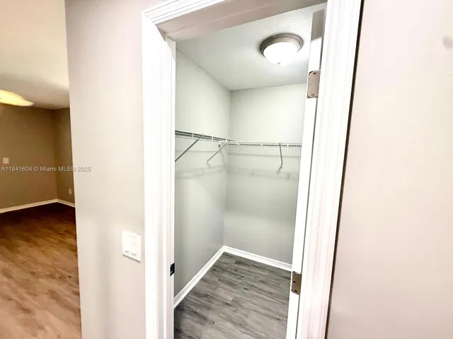 a view of small space with racks on the wall