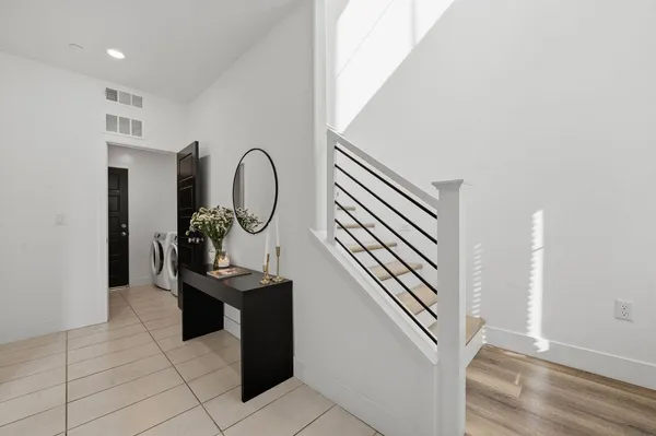 a view of a hallway with seating area