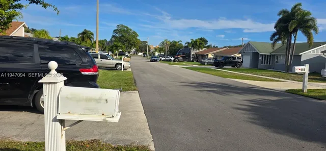 a cars parked on the side of a street