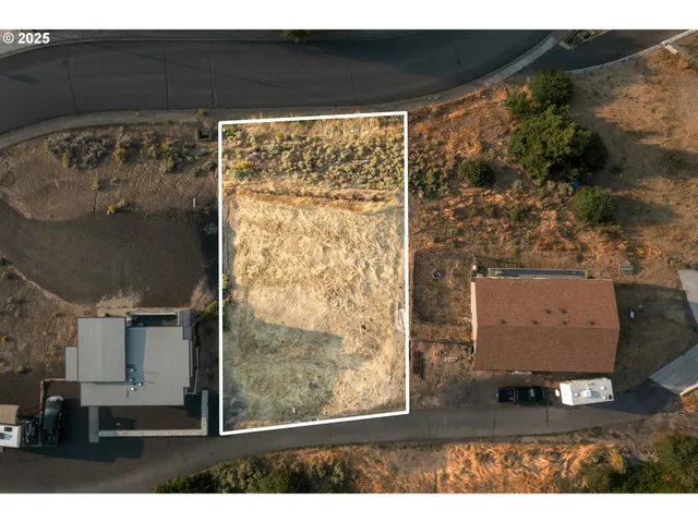 a view of a couch in front of a window