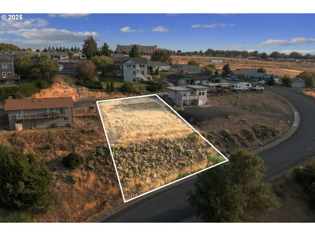 a view of a lake in middle of the town