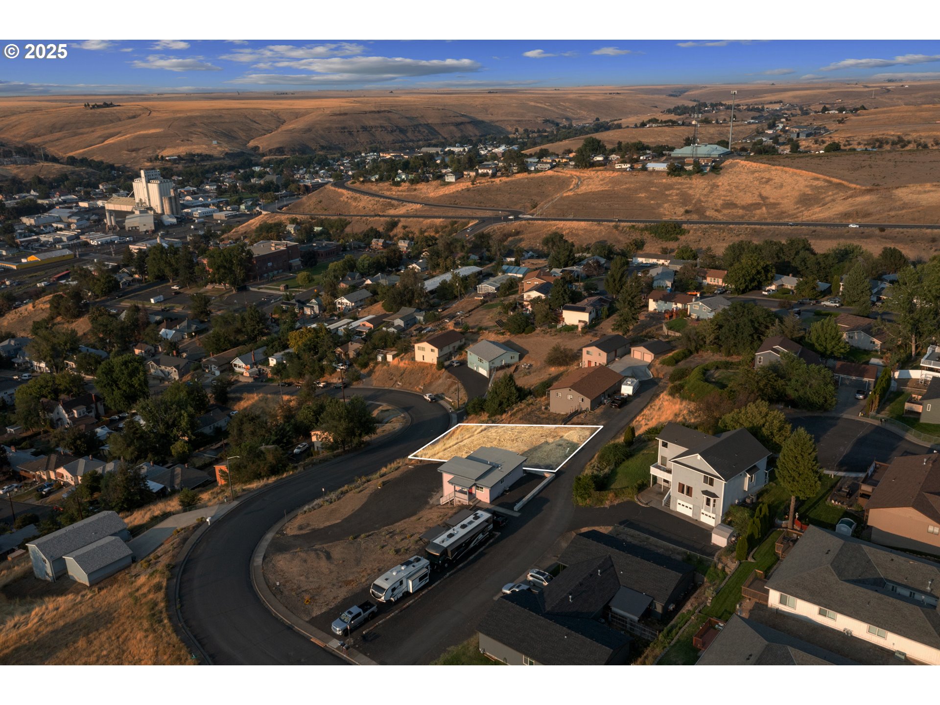 922 South Main Street Pendleton, OR 97801 - Photo 5 of 13 an aerial view of residential building with parking and yard