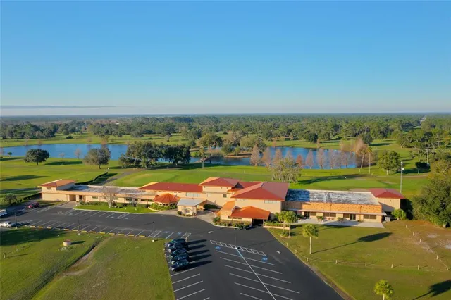 an aerial view of a houses with outdoor space