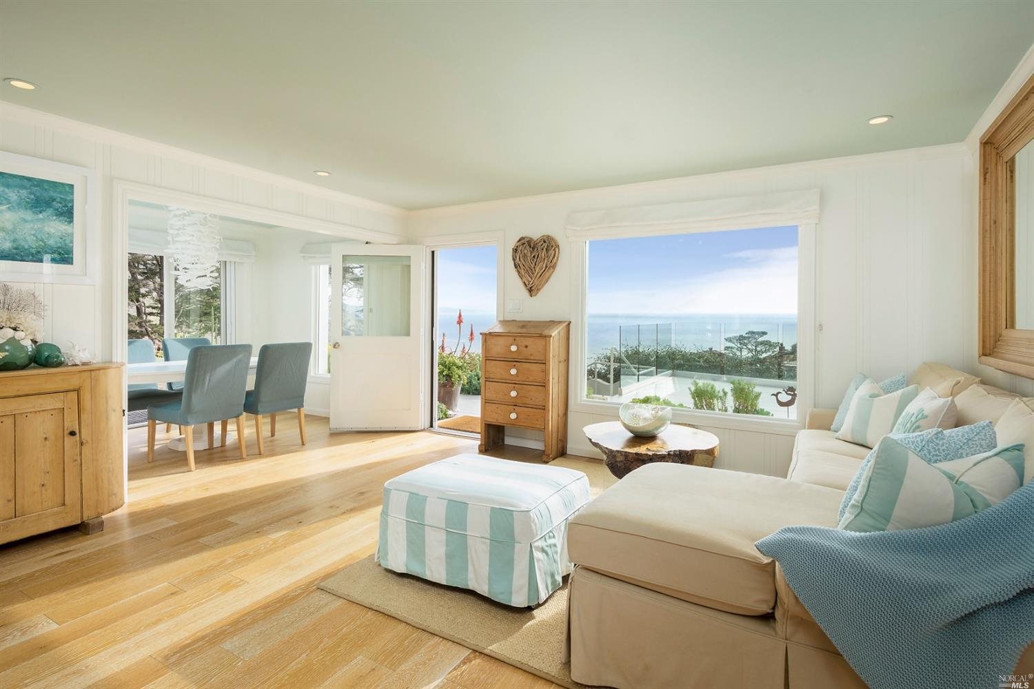 130 Sunset Way Muir Beach, CA 94965 - Photo 1 of 1 a living room with furniture and a fireplace