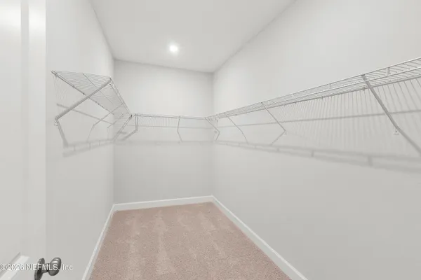 a view of a room with racks on the wall