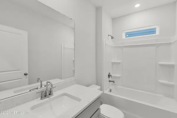 a view of room with bathroom