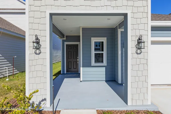 a view of a entryway door front of house