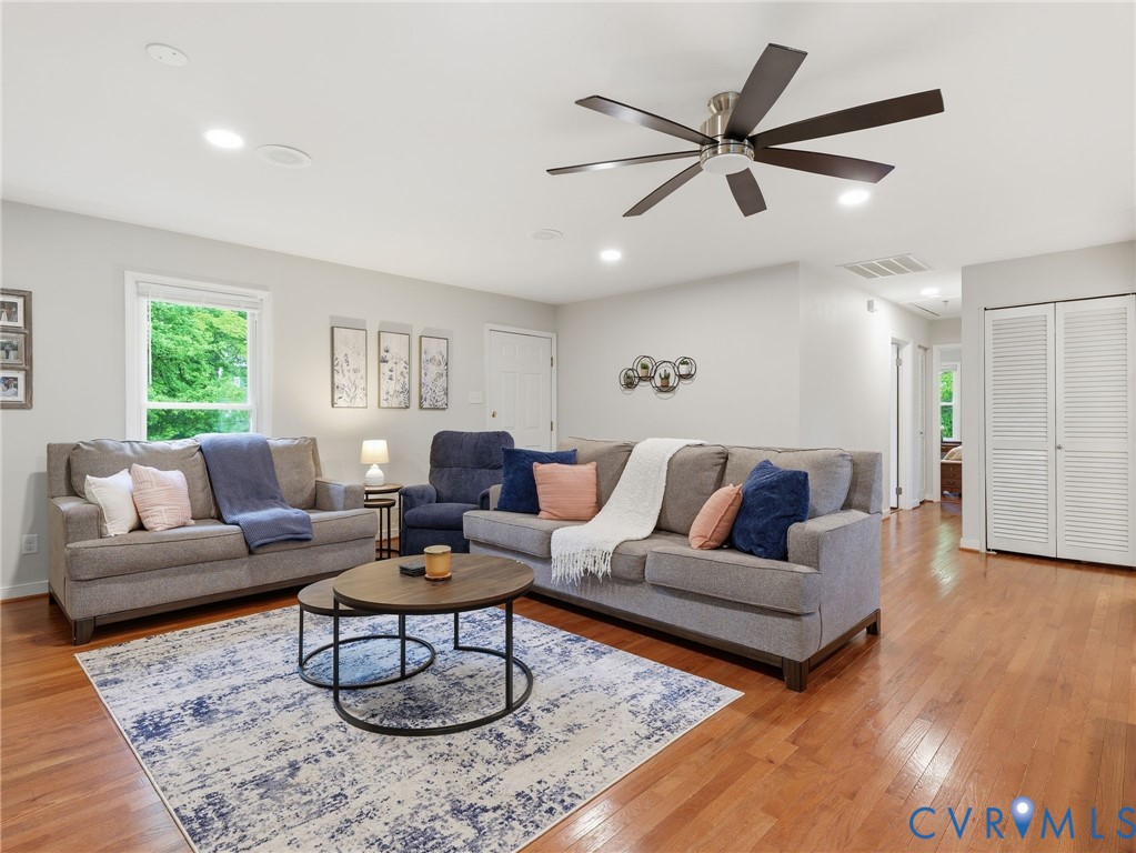 7707 Woodbrook Road Quinton, VA 23141 - Photo 11 of 42 Spacious living area featuring polished wood-finis