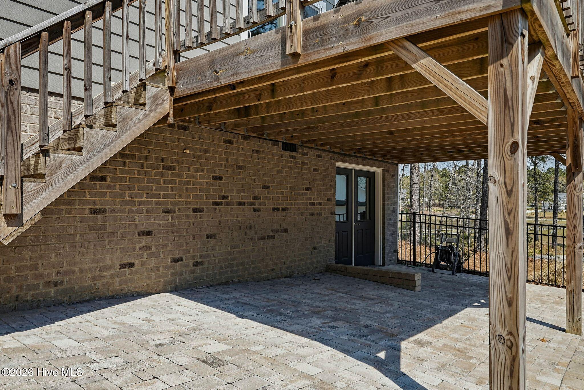 121 Longleaf Drive West End, NC 27376 - Photo 41 of 68 Lower level covered patio