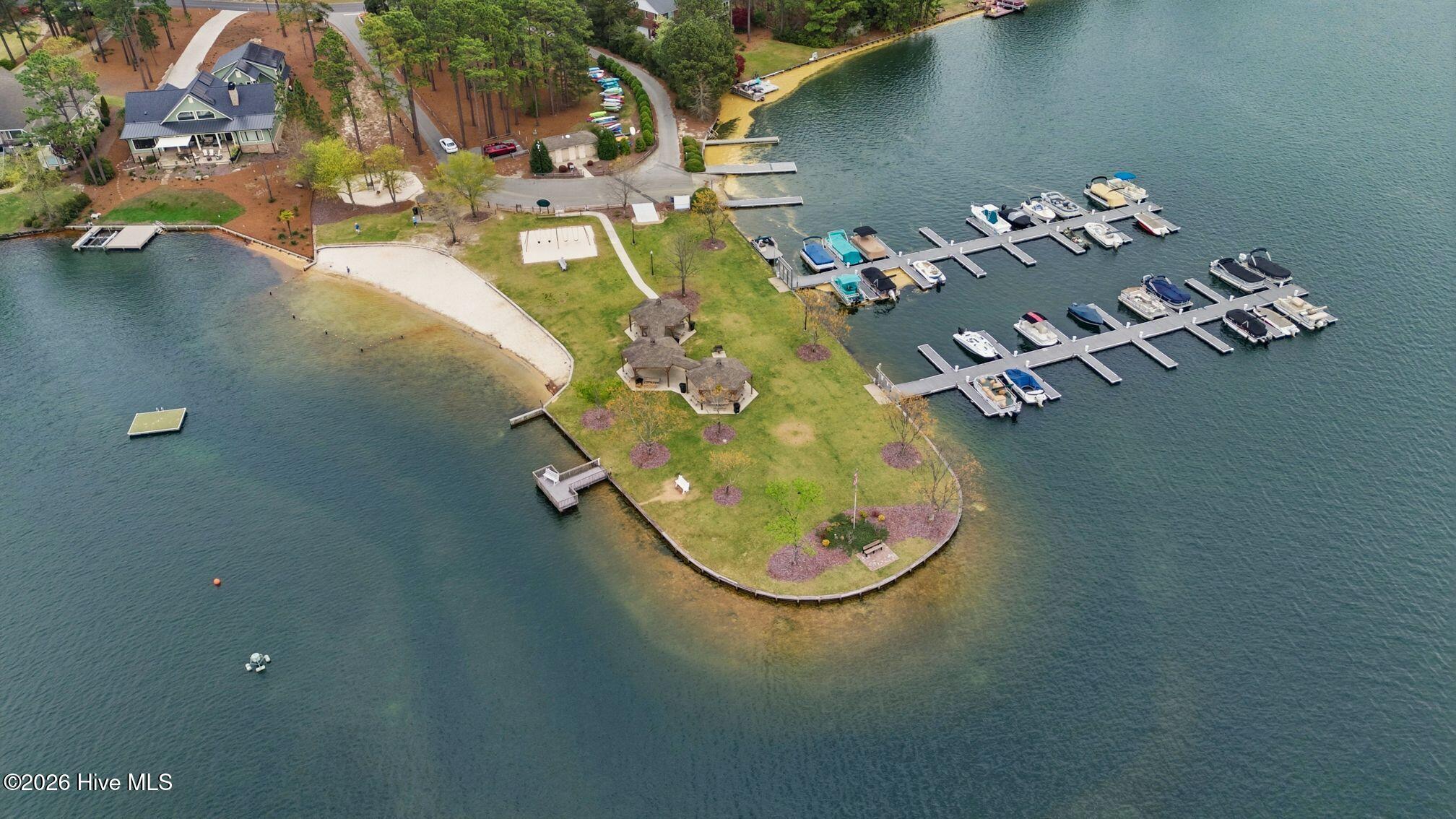 121 Longleaf Drive West End, NC 27376 - Photo 64 of 68 Marina beach, gazebo and playground area