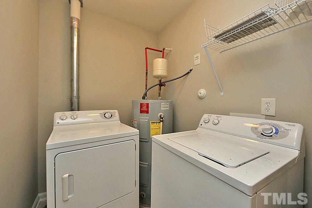11701 Coppergate Drive, Unit 107 Raleigh, NC 27614 - Photo 13 of 13 a utility room with dryer and washer