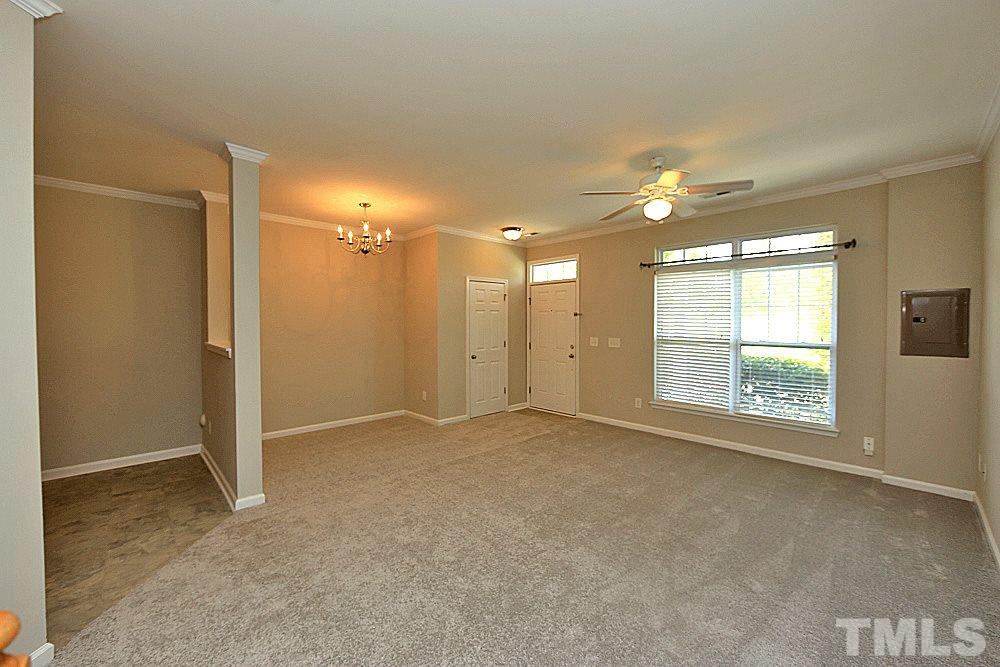 11701 Coppergate Drive, Unit 107 Raleigh, NC 27614 - Photo 5 of 13 a view of an empty room with a window