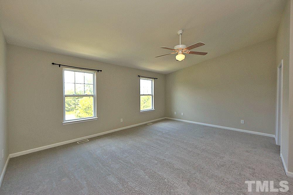 11701 Coppergate Drive, Unit 107 Raleigh, NC 27614 - Photo 8 of 13 a view of an empty room with a window