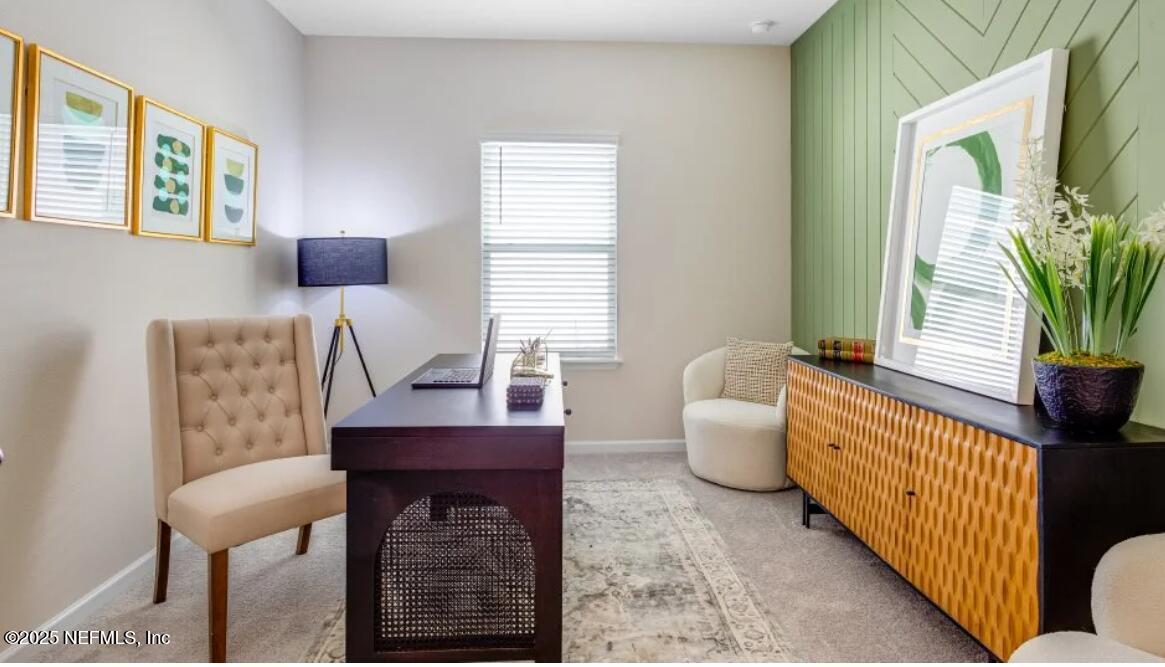 3203 Tupelo Loop Green Cove Springs, FL 32043 - Photo 18 of 22 a living room with furniture and a large window