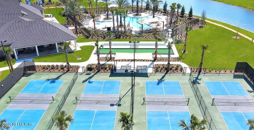 3203 Tupelo Loop Green Cove Springs, FL 32043 - Photo 10 of 22 a view of a swimming pool with a patio