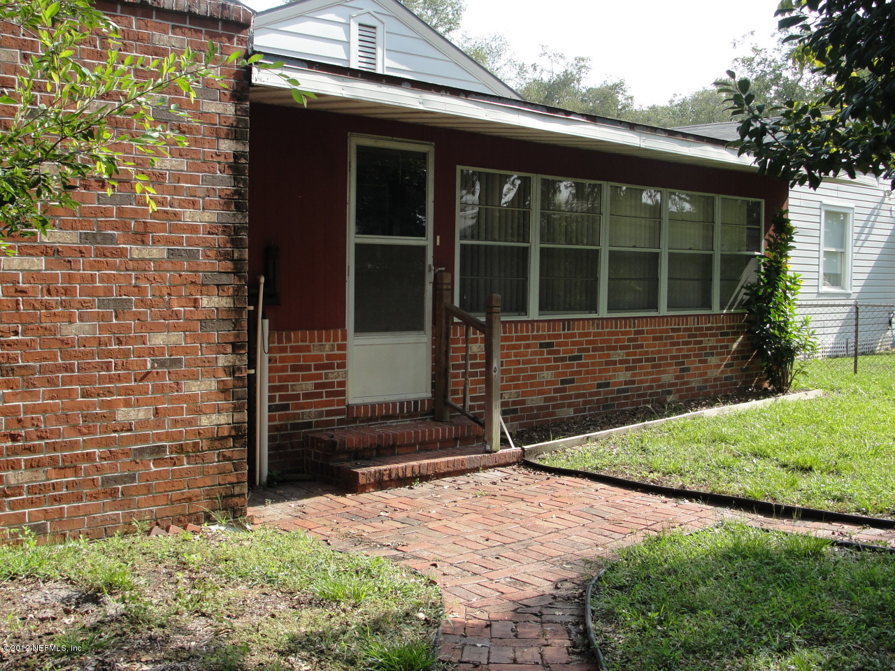 4656 Manchester Road Jacksonville, FL 32210 - Photo 21 of 31 a small garden in the backyard of a house