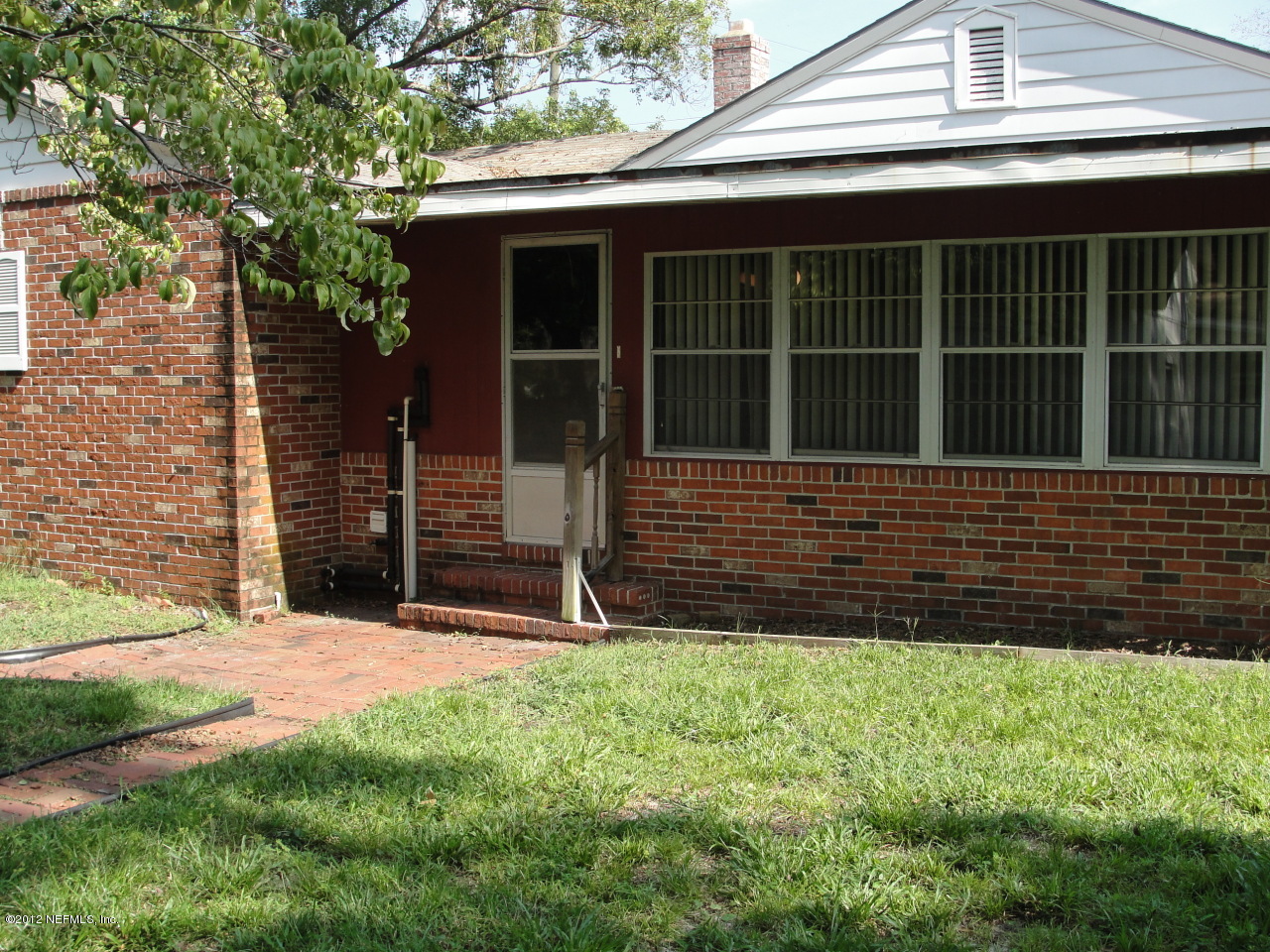 4656 Manchester Road Jacksonville, FL 32210 - Photo 25 of 31 a view of house with backyard