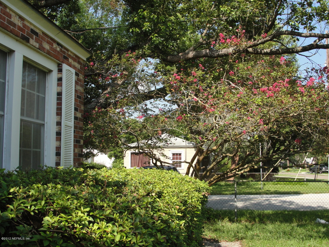 4656 Manchester Road Jacksonville, FL 32210 - Photo 28 of 31 a view of a house with a tree
