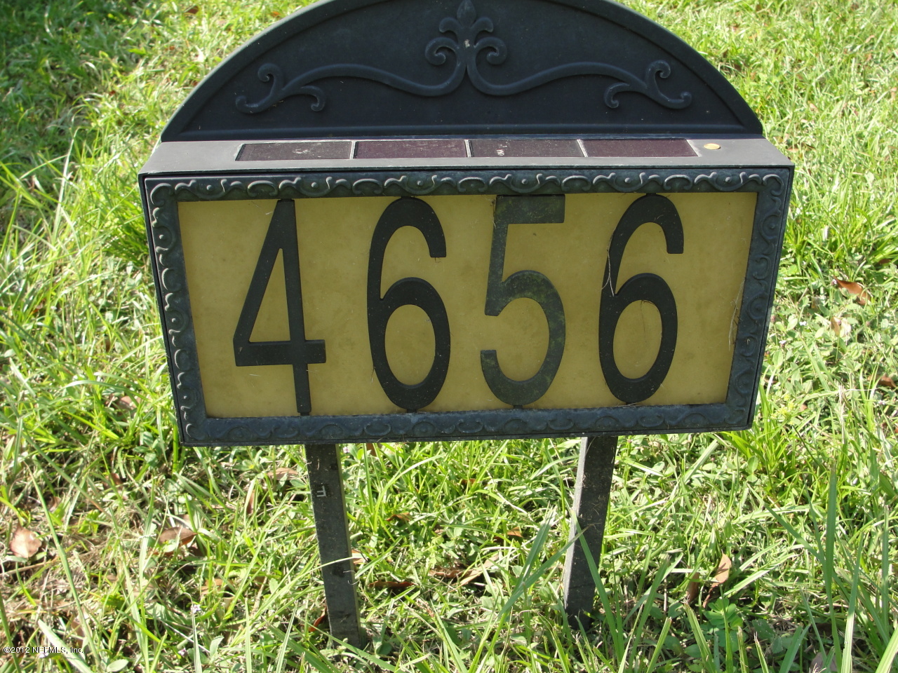 4656 Manchester Road Jacksonville, FL 32210 - Photo 30 of 31 a sign that is on a brick wall