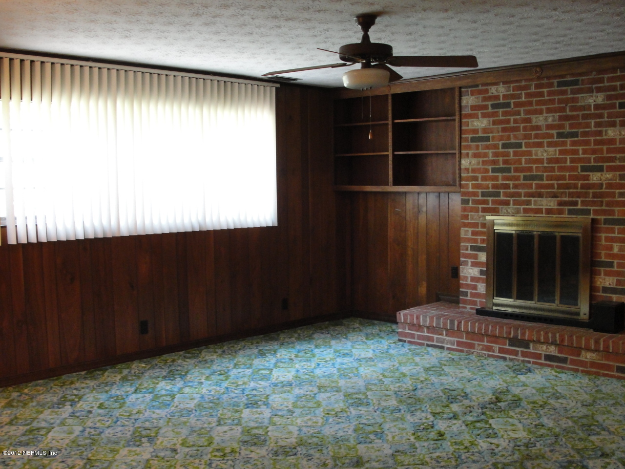4656 Manchester Road Jacksonville, FL 32210 - Photo 6 of 31 a view of an empty room with a window