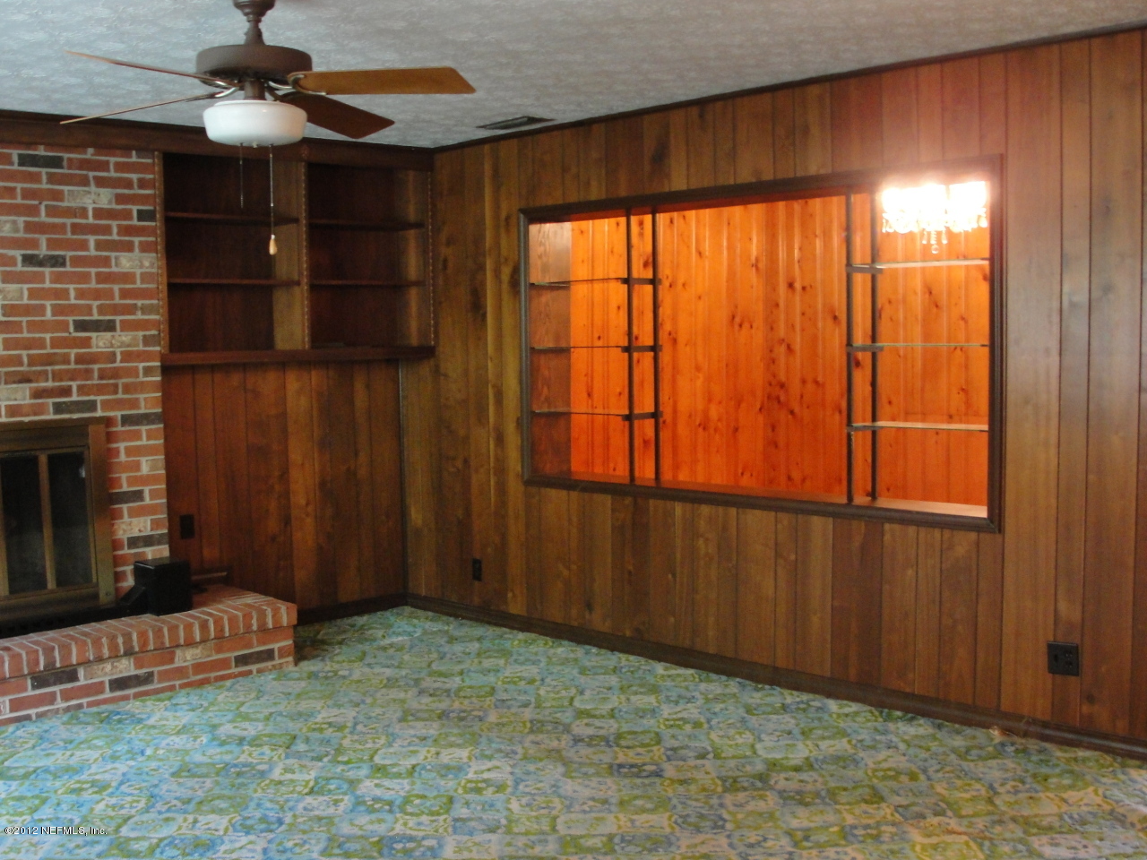 4656 Manchester Road Jacksonville, FL 32210 - Photo 9 of 31 a view of an empty room with a window