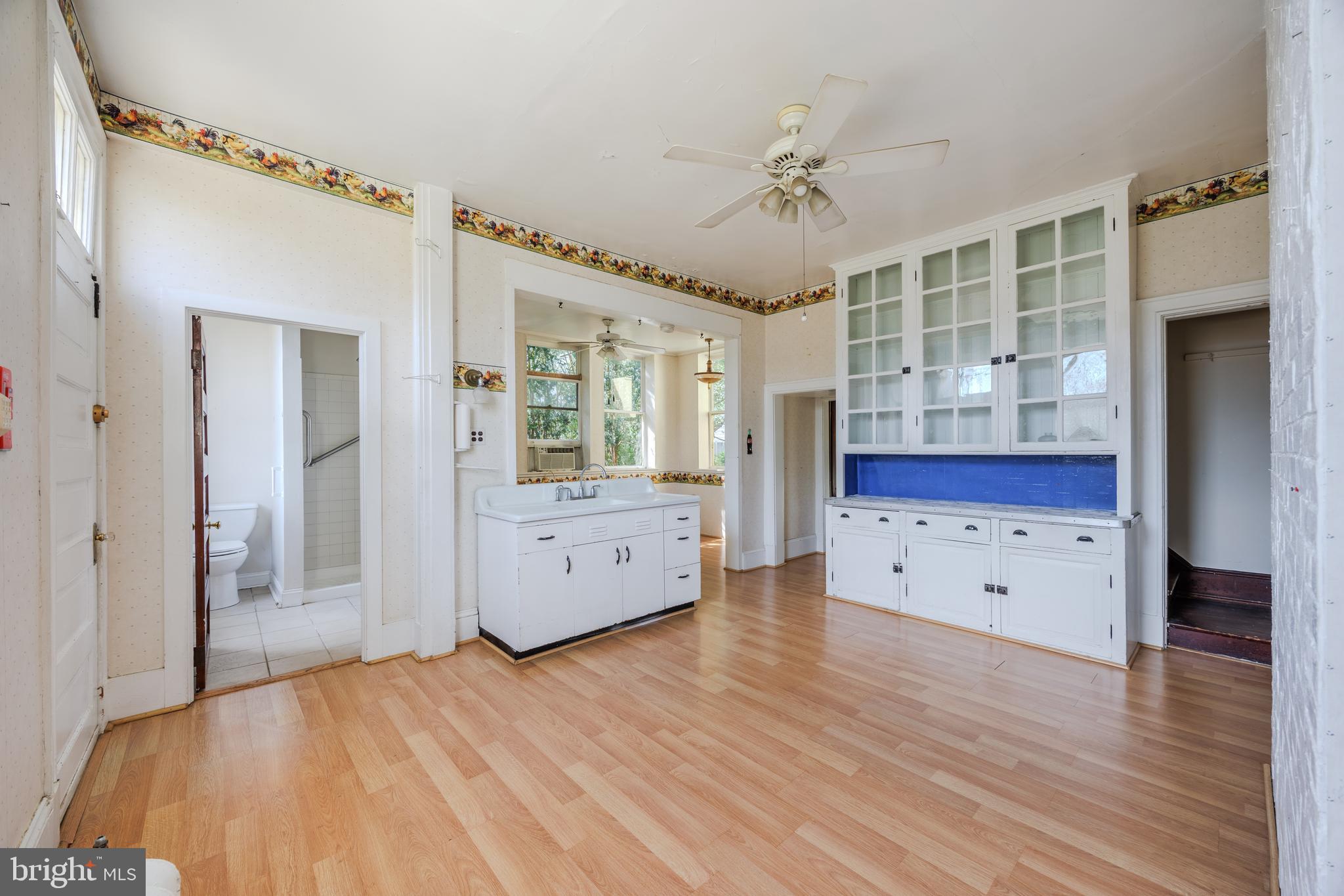242 East Main Street Elkton, MD 21921 - Photo 18 of 53 a view of a bedroom with wooden floor and windows