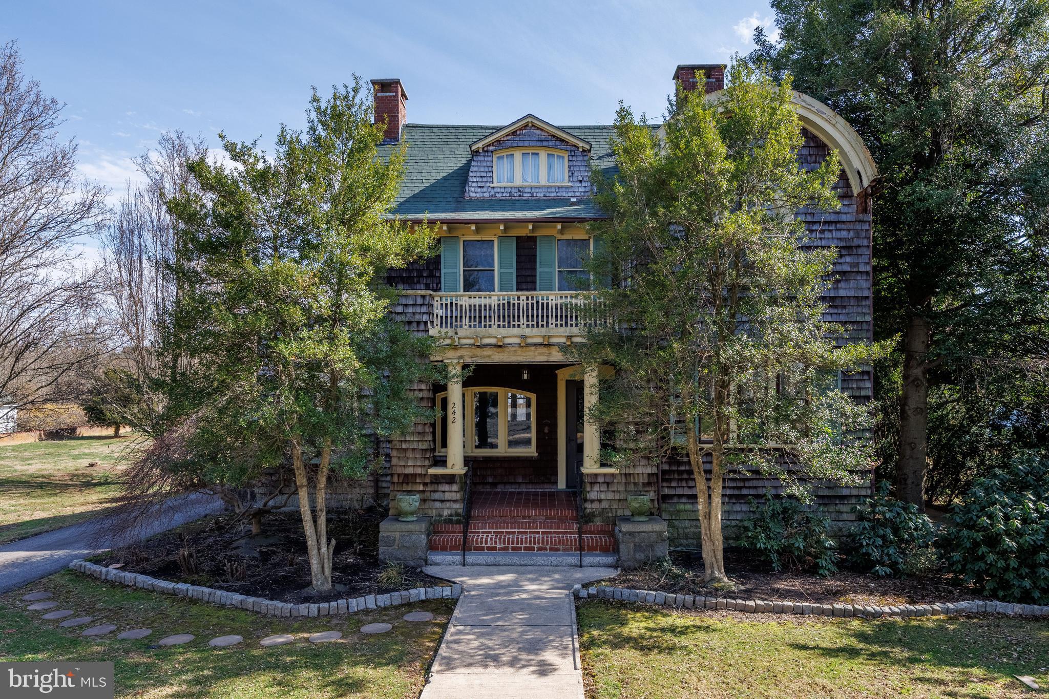 242 East Main Street Elkton, MD 21921 - Photo 2 of 53 a front view of a house with swimming pool