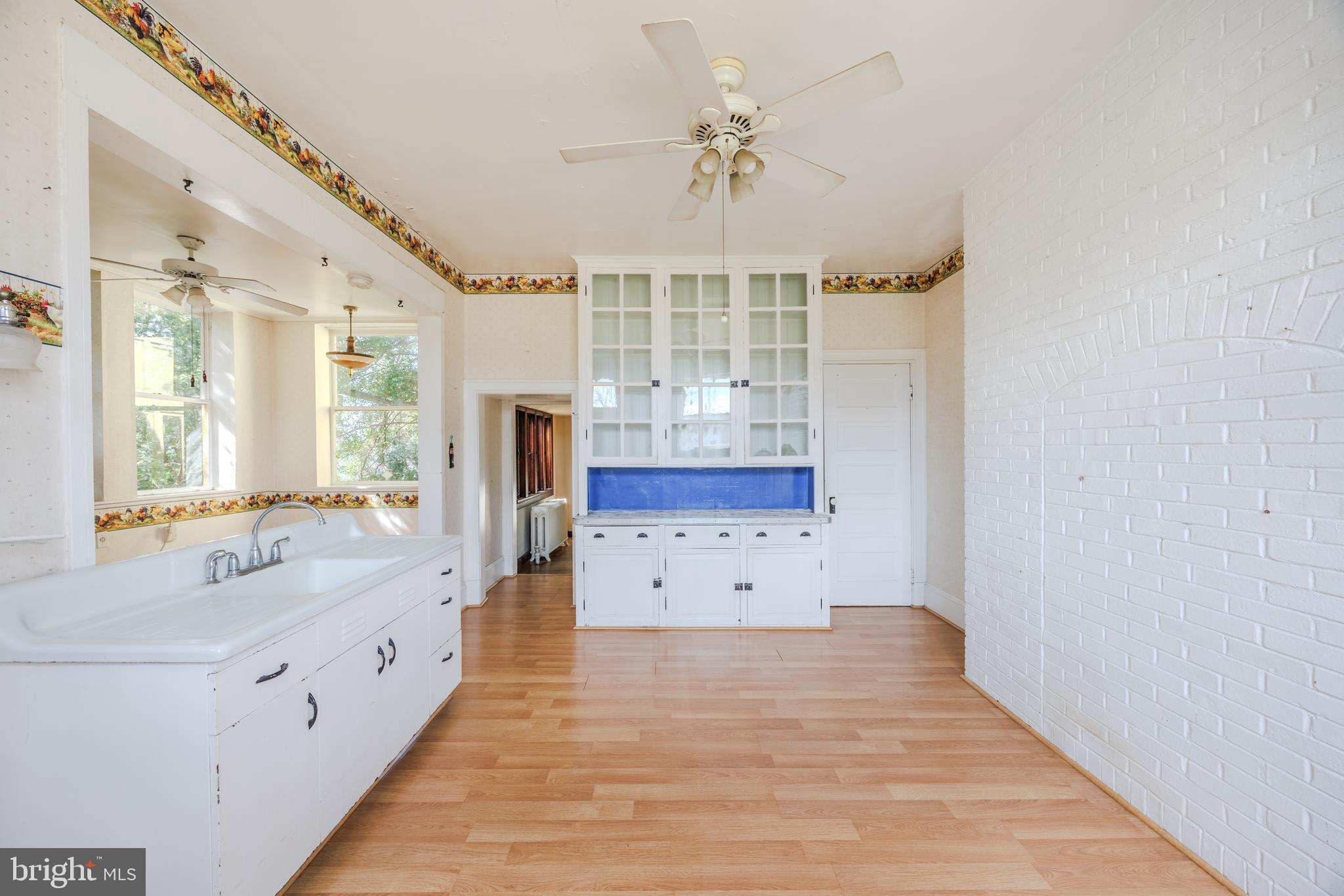 242 East Main Street Elkton, MD 21921 - Photo 21 of 53 a spacious bathroom with a double vanity sink a mirror and a bathtub