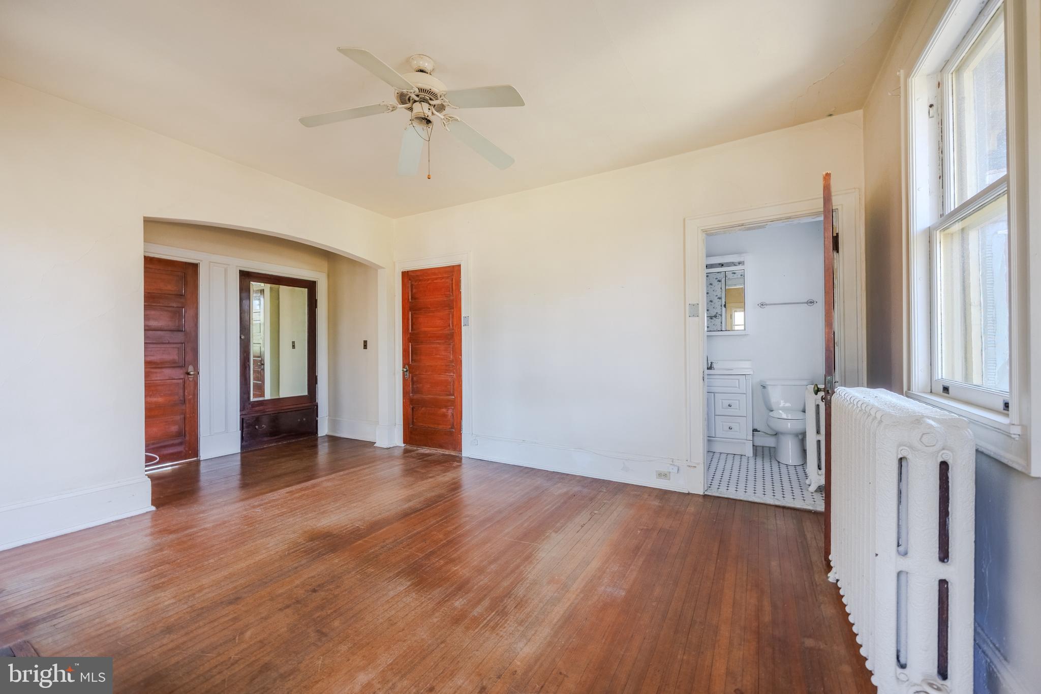 242 East Main Street Elkton, MD 21921 - Photo 33 of 53 wooden floor in an empty room with a window
