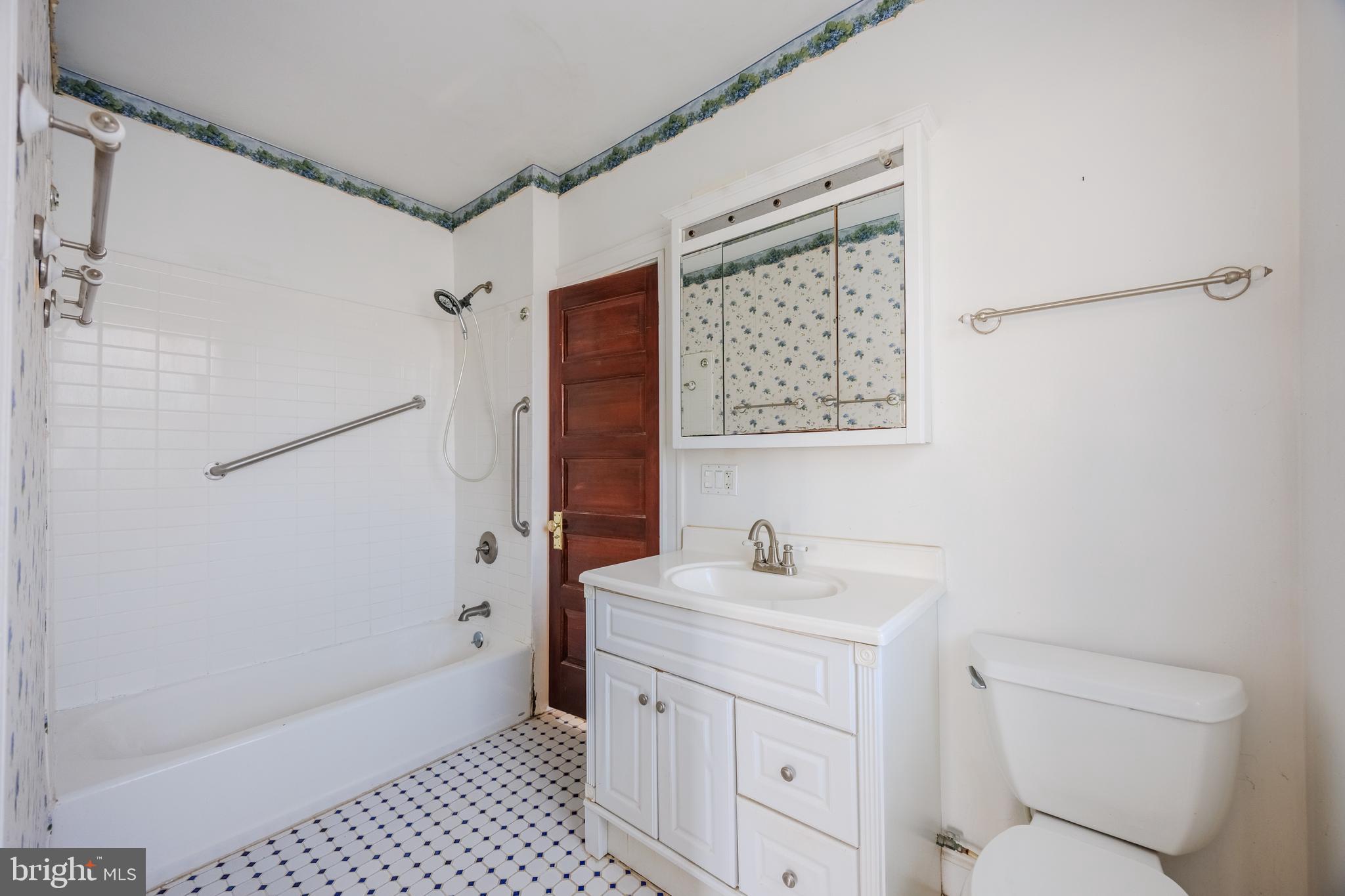 242 East Main Street Elkton, MD 21921 - Photo 35 of 53 a bathroom with a sink toilet and shower