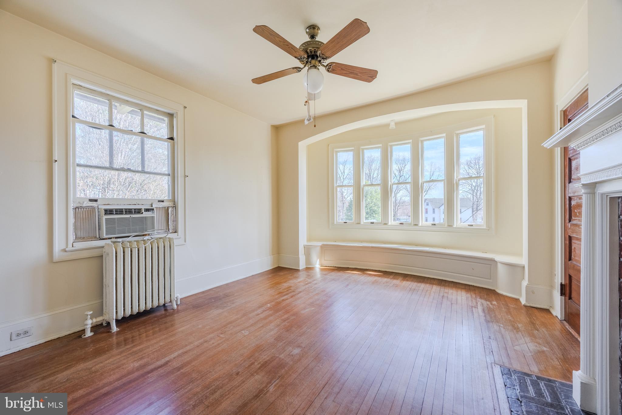 242 East Main Street Elkton, MD 21921 - Photo 37 of 53 an empty room with wooden floor and windows