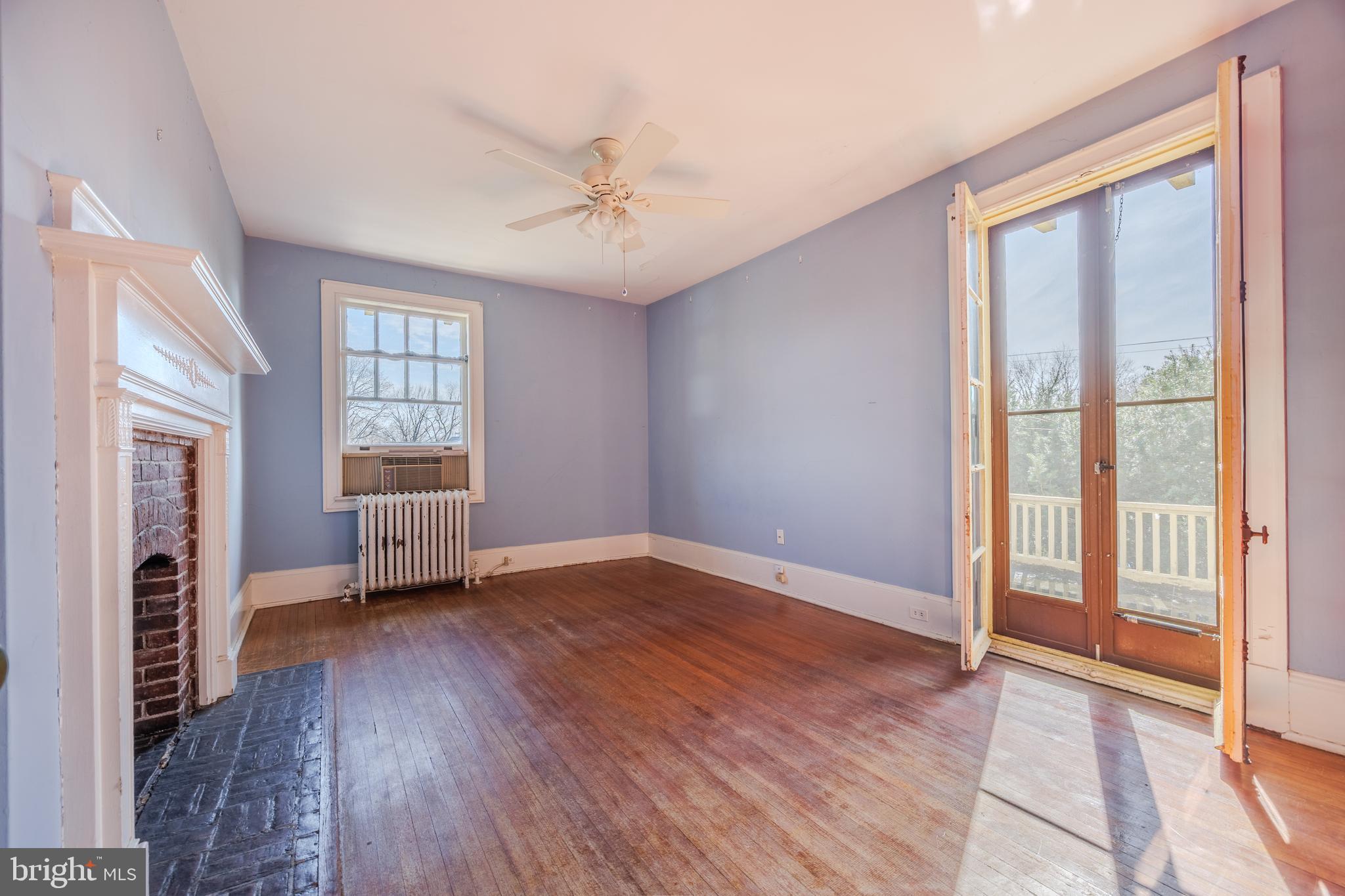 242 East Main Street Elkton, MD 21921 - Photo 40 of 53 wooden floor in an empty room with a window
