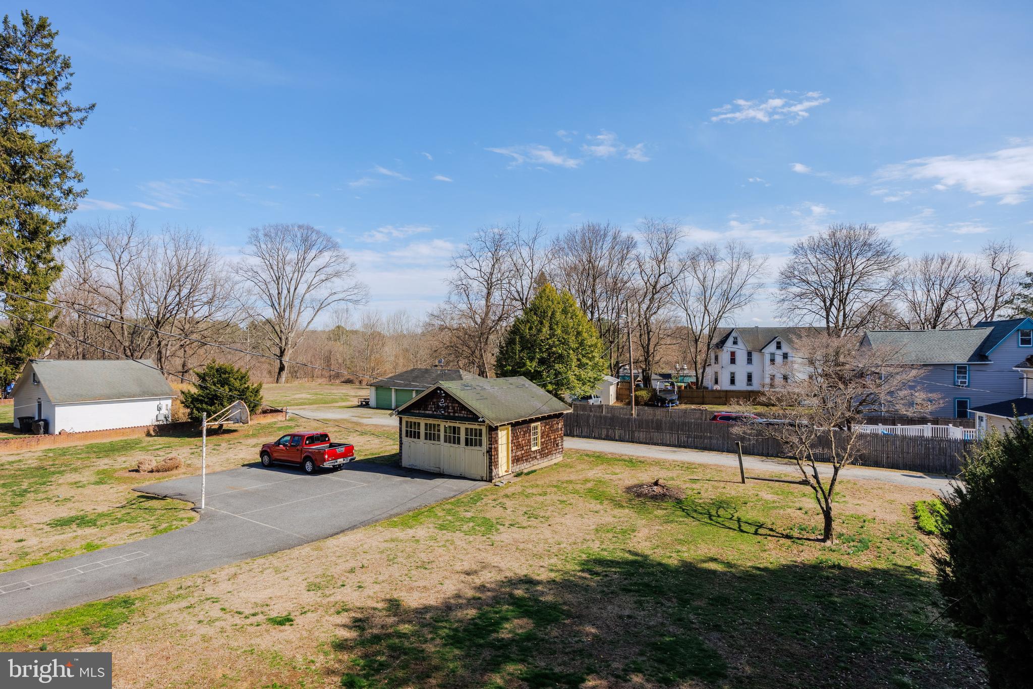 242 East Main Street Elkton, MD 21921 - Photo 43 of 53 a swimming pool with outdoor seating and yard