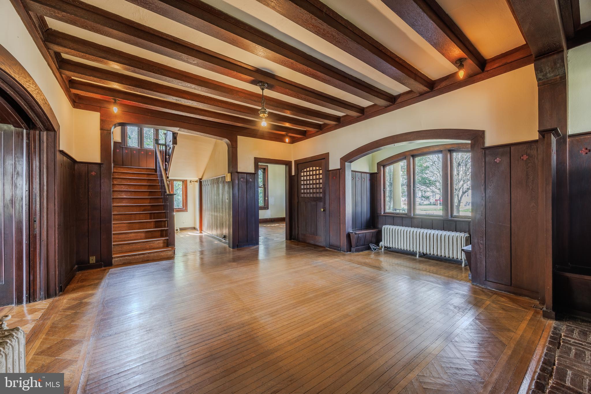 242 East Main Street Elkton, MD 21921 - Photo 10 of 53 a view of empty room with wooden floor and stairs