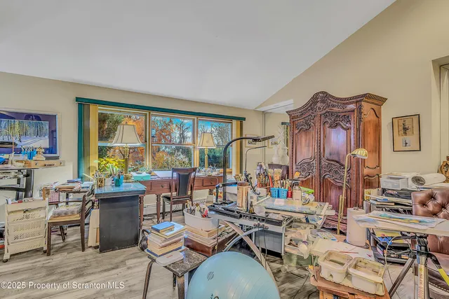 a very nice looking living room with furniture and floor to ceiling windows