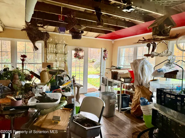a view of gym equipment and living room