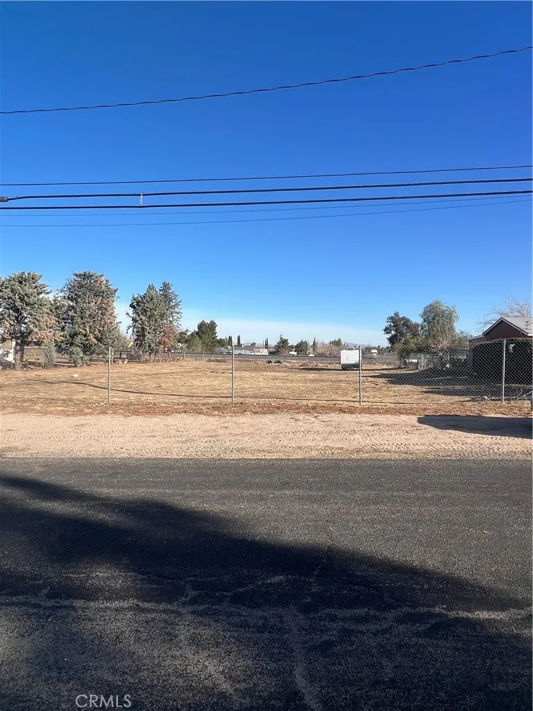 a view of a floor to ceiling window and an ocean view