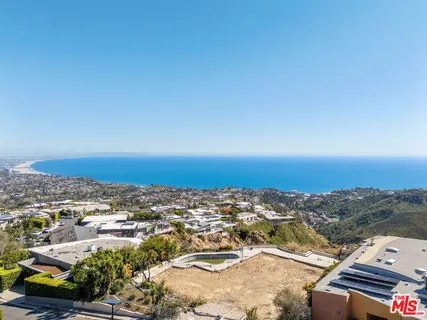 an aerial view of residential building and city view