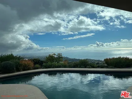 a view of lake and mountain