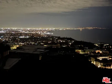 a view of city and mountain